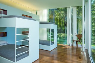 A Thomas Phifer-Designed Glass-and-Steel Masterpiece For Sale - Photo 10 of 14 - Another bedroom in the guest house serves as a children’s room and includes bunk beds that were built into the wall by Phifer.