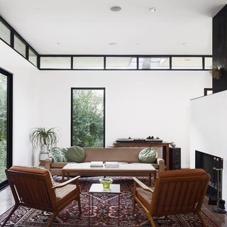 A Glimpse Into a Remodeled Midcentury Abode in Austin - Photo 2 of 4 - This photo that Calo took of the central living space is marked by tall ceilings, clerestory windows, and a cold-rolled steel fireplace. 