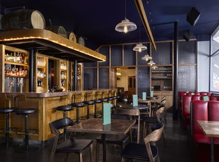 Gin Enthusiasts Will Be Flocking to This New London Hotel - Photo 4 of 7 - In The Resting Room, master distiller Jake Burger and a team of instructors create their gin in two 30-liter copper stills on-site. You can also test out a curated selection of international spirits that have been aged in handmade barrels that sit above the bar.