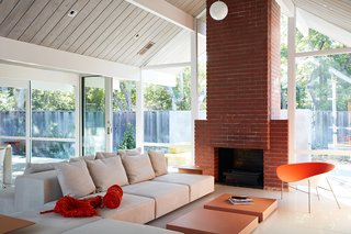 In order to open up the space, Klopf Architecture took out a few walls that were supporting overhead beams. Klopf explained, "We used the structural trick of putting a supportive cross-beam on the roof, which you don’t see. The ceiling now has an open, more expansive feeling—it's more post-and-beam." 