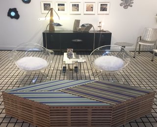 Follow Us Through San Francisco’s FOG Design & Art Fair - Photo 10 of 10 - The presentation from New York-based Patrick Parrish was jam-packed with artful home pieces by designers from all decades—and made with a diverse range of materials. Pieces shown from front to back include: Waldhexen Table by Ian Stell; vintage Erwine and Estelle Laverne lucite chairs for The Invisible Group (1960s); rubber, brass, and wood credenza by Brian Thoreen; Crane series of freestanding lights by Bec Brittain; slab-constructed ceramic vessels by Cody Hoyt. 
