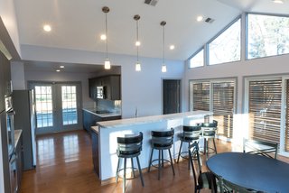 The Winning Vision From a Universal Design Competition Is Brought to Life For a Veteran - Photo 5 of 8 - Along with exterior sunscreens, they installed interior shades that can be lowered for privacy and protection from the sun when desired. 