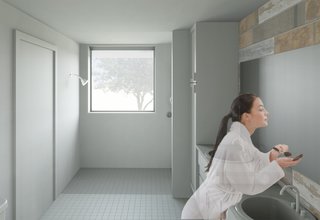 The Winning Vision From a Universal Design Competition Is Brought to Life For a Veteran - Photo 7 of 8 - The bathroom was designed with an open layout to provide enough space for someone in a wheelchair to operate comfortably.