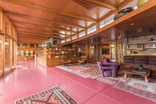 Frank Lloyd Wright’s Last Major Residential Masterpiece Could Be Yours for $8 Million - Photo 3 of 11 - The red flooring that runs throughout the interior is Colorundum in Cherokee red, a color Wright loved to use in his projects. Jim Gricar of Houlihan Lawrence explains that the flooring is made up of a series of minerals that have a low freezing point, which makes it difficult to crack. 