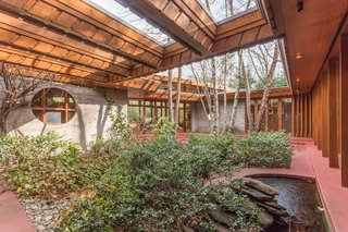 Frank Lloyd Wright’s Last Major Residential Masterpiece Could Be Yours for $8 Million - Photo 8 of 11 - Since Wright was consistently focused on nature, he built an internal courtyard that creates a peaceful retreat in the middle of the structure. 