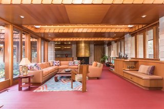 Frank Lloyd Wright’s Last Major Residential Masterpiece Could Be Yours for $8 Million - Photo 5 of 11 - In the family room—which also holds a gold leaf-covered concrete fireplace—large skylights run the width of the space. 