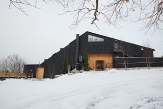 A Modern Mountain Lodge That Will Make You Love Winter Like Never Before - Photo 1 of 13 - When the property was first designed by Guy Chirico Sr. in 1966, it was built with a modernist approach to be the Scribner Hollow Motor Lodge. It took place during a time when the Catskills started to become one of the hottest places to be for NYC-dwellers who wanted to escape for the weekend. Since then, the Hudson Valley has seen a substantial amount of growth that caters to creatives seeking an inspirational refuge.