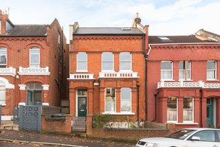A Fusion of Old and New Makes this Home For Sale Shine on London’s Womersley Road - Photo 1 of 8 - While the structure itself was preserved as much as possible, Robert Dye Architects installed new double-glazed sash windows on the front and refurbished the rear windows.