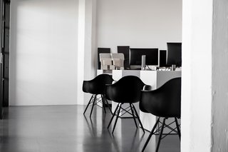 A San Francisco Design Collective Reveals its Impeccably Cool Creative Studio - Photo 12 of 12 - The space is also filled with Herman Miller’s all-black edition of the Eames Molded Fiberglass Armchair.