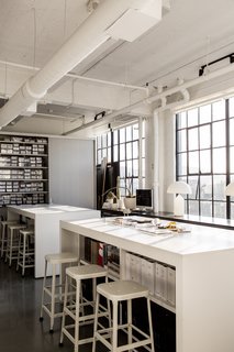 A San Francisco Design Collective Reveals its Impeccably Cool Creative Studio - Photo 9 of 12 - Hollis made sure to create areas where vendors, artists, and artisans can drop off their work or samples. Shown here is the materials library and high-top tables that provide storage and allow for casual, impromptu meetings.