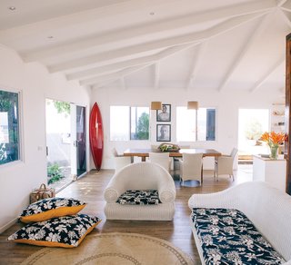 Raimana Van Bastolaer’s living room—his favorite part of his house—showcases a Gerry Lopez Board that Red Bull gave to him.