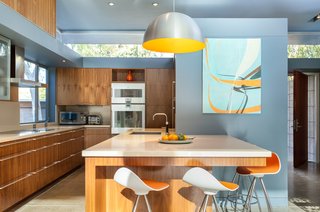 A Year of Careful Study Leads to a Thoughtful Renovation of a 1949 Eichler - Photo 7 of 10 - The kitchen is part of the new section in the center of the house and features clerestory windows that let natural light flood into the space. 