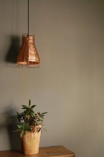 Part II of Our Exploration of Mexico City’s Caravana Americana - Photo 3 of 18 - The process of turning recycled copper into a modern lamp can take one to two days per piece. Once the hammered or woven pieces are finished, they’re heat-treated to seal in a patina, or polished for a copper shine. 