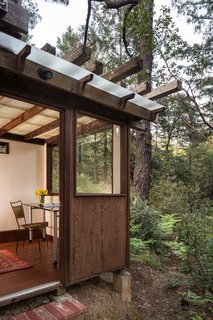 The Midcentury Home That Daniel Liebermann Built For His Parents Asks $2.8 Million - Photo 15 of 16 - Jay and his father built a tiny office with red Dutch doors under the deck where they could escape from the constant action that occurs when you live with a large family.