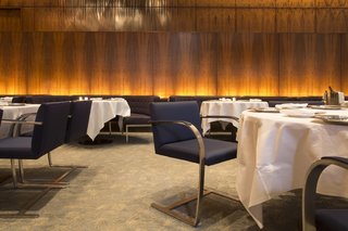Wright Auctions Off Items from the Seagram Building's Four Seasons - Photo 3 of 4 - The Grill Room featured cantilevered Brno chairs by Ludwig Mies van der Rohe and banquettes by Philip Johnson, who was known to dine at his preferred seat, at table 32.