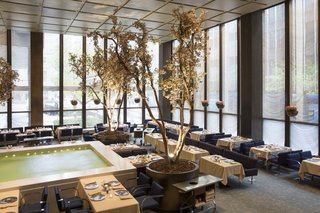 Wright Auctions Off Items from the Seagram Building's Four Seasons - Photo 1 of 4 - Featuring a bubbling water feature punctuated with seasonal trees, the International Style–designed Pool Room was home to many a power lunch over the years.