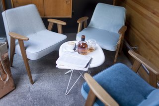 An instant success upon its 1962 release, Chierowski's 366 Easy Chair was a staple seen in homes, cafes, offices, and restaurants throughout the Eastern Bloc for nearly three decades. Shown here, the re-edition comes in various upholstery options, including tweed and velvet.