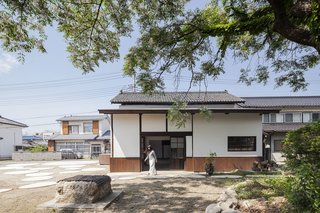 7 Warehouse Conversions: Turning Industrial Buildings Into Modern Commercial Spaces - Photo 3 of 13 - In an agricultural town in Japan's Yamanashi prefecture, a derelict sake warehouse was salvaged by the people of the town and turned into a community venue with an interior stage for meetings and performances.
