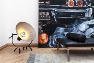 A Hidden Passageway Makes Each Room in This Berlin Flat a Private Destination - Photo 2 of 6 - Vintage details, like this metal floor lamp, contrast with parquet floors in a subtle nod to an industrial aesthetic.