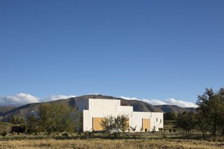 A Minimalist Retreat at the Edge of South Africa's Karoo Desert - Photo 1 of 6 - London-based firm Openstudio Architects designed a retreat on the outskirts of Prince Albert, a town that sits near a pass of the Swartberg mountain range in South Africa. 