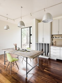 A Family's California Ski Retreat is Designed to Blend in With Its Site - Photo 4 of 5 - To maximize the space for guests, the structure features six private sleeping areas, including two that do double duty, like this space that incorporates an office. 