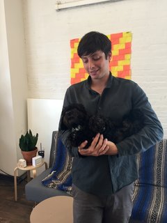 Inside the Designer's Studio: Good Thing - Photo 1 of 5 - Good Thing founder Jamie Wolfond holds office mascot Arthur in the Brooklyn office of his manufacturing brand, Good Thing.