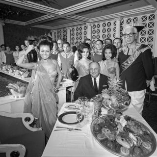 The Architecture of Excess: Caesars Palace at 50 - Photo 5 of 7 - Caesars founder Jay Sarno enjoys a feast the the original Bacchanal restaurant, 1967.