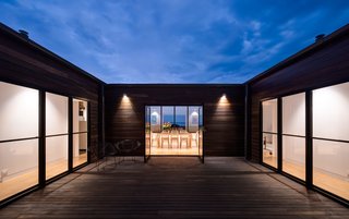 A courtyard at the center of the home offers an outdoor space with protection from the harsh coastal winds. The 270-square-foot patio faces south to enjoy views of the ocean.