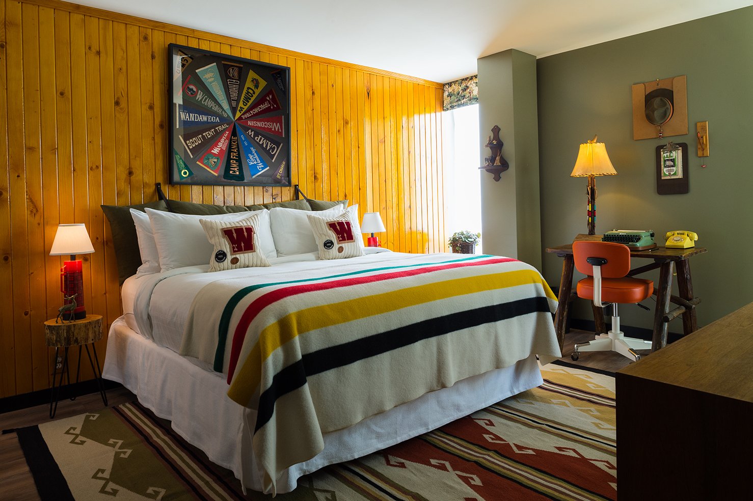 The idea for the custom room comes from Camp Wandawega's line for Land of Nod, which celebrates the whimsical vintage aesthetic of the retreat. A former Prohibition speakeasy once called