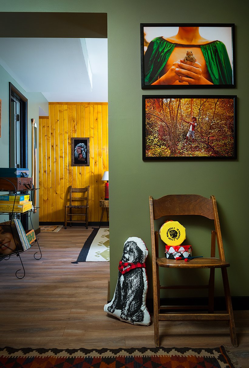 Art and games throughout the space invoke camp memories. Much of the art and accessories, like the photographs above, come from the Camp Wandawega Land of Nod collaboration.