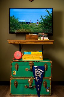 This Wisconsin Hotel Suite Conjures the Best of Summer Camp—Hold the Bug Spray - Photo 9 of 9 - The room comes fully stocked with a collection of camp-themed movies.
