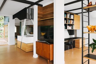 An Australian Renovation Gives New Life to Midcentury Style - Photo 4 of 14 - Two angled columns emerge from the kitchen, one of many ways Nest used geometry to divide the space without obstructing sight lines. The architects intentionally opted for oblique angles that would provide a variety of different views.