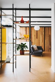An Australian Renovation Gives New Life to Midcentury Style - Photo 6 of 14 - Open shelving lends an organizing grid without obstructing views. 