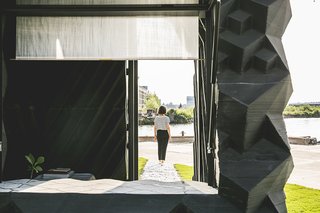Stay in This 3D-Printed Tiny House - Photo 14 of 19 - The Urban Cabin is a research project for DUS's larger-scale investigations into 3D-printed architecture. It is made almost completely of a bio-plastic that can be shredded and printed into new objects at the end of its lifecycle.
