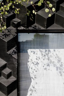 Stay in This 3D-Printed Tiny House - Photo 13 of 19 - The textured surface reveals the 3D-printing technique.