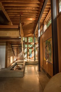 This Updated Breuer House Could Be Yours for a Cool $2.3 Million - Photo 2 of 3 - The new spaces recall the original design with their use of natural materials like wood and stone.