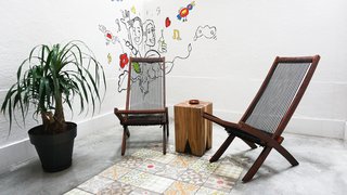 The patio features a cement floor inlaid with traditional <i>baldosa hidráulico</i> tiles by Pinar Miró. A friend of the resident painted the mural.