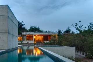 The house is laid out as a linear series of structures.