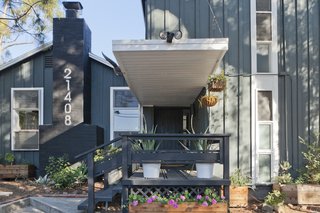 Graphic Design Inspired This Handcrafted Canyon Hideaway - Photo 1 of 10 - In California's Topanga Canyon, Lara and Chad Hogan used their creative backgrounds to transform a 1948 cabin with a 1960s post-and-beam addition into a personalize family home—and developed a design business in the process.
