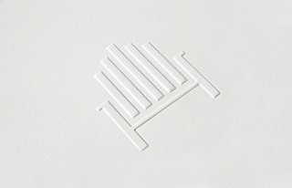 Pentagram Gives a Local Bookstore a Homespun New Identity - Photo 2 of 4 - The silhouette of an Adirondack chair, seen here on embossed stationery, references the store’s resort town setting. 