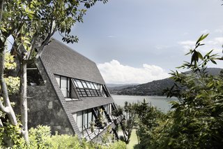 The home’s natural attraction is its peak, which contains two equally sized, back-to-back bedrooms. 