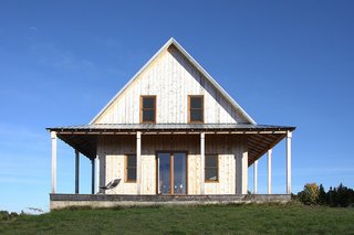 White pine from the Roths’ own property was used for trim. Some of the wood was left unfinished, as were other elements. "Under the porch roof there’s no cladding," notes Freiesleben. "If you had more money, you’d hide it, but it’s not necessary or even desirable."