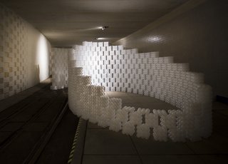 Architecture Remix - Photo 2 of 8 - Through trial and error, the studio had to find the right hot glue to make the cubes durable. A glue best suited for compression from 3M was required for the units that made up the seating while a more standard hot glue was applied in general. 