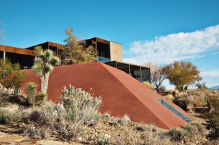 House of the Week: This Prefab Hits the Jackpot in Las Vegas - Photo 2 of 2 - Near the main house, James Turrell’s pyramidal Skyspace structure invites visitors into its dark recess for a chance to view the heavens through a perspective-altering cutout. Most of Murren’s museum-quality art collection is inside the house, including a Robert Rauschenberg piece, a set of Andy Warhol prints, and a hologram by Turrell.