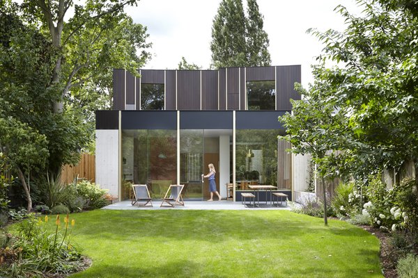 This Modern Courtyard Home Celebrates a 100-Year-Old Tree - Photo 2 of 8 - Landscaping was designed by Gardenia Gardens.