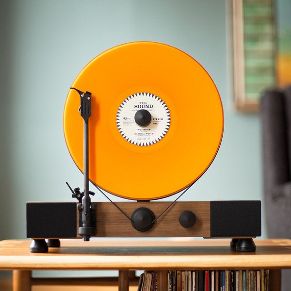 How to Use Modern Home Decor in Unexpected Ways - Photo 6 of 9 - How about this upright record player to start a conversation‚ or to brighten a living room with sound, color, and style?