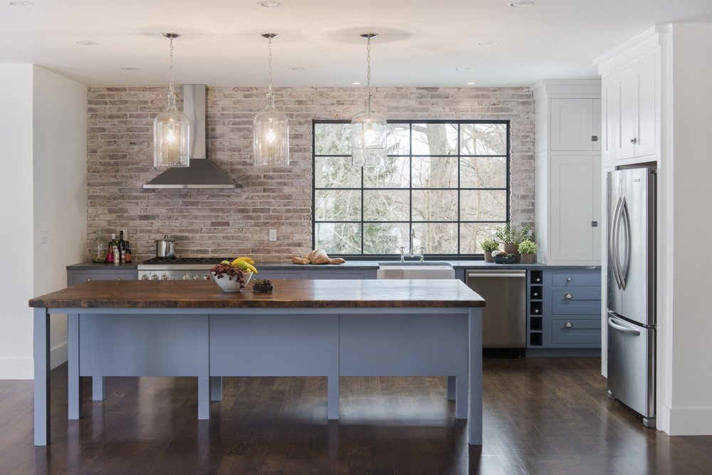 This beautiful Arlington kitchen by Pinney Designs features a Marvin Contemporary Direct Glaze window with contrasting black painted interior to set off the industrial brick wall.
Design: Pinney Designs
Photo: Ben Gebo
#industrial #butcherblock #marvin #kitchen