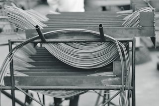 The stainless steel metal rods used in the assembly of the Bertoia Collection. Image from the Knoll Archive.