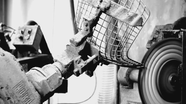 Making Bertoia - Photo 9 of 14 - Edges buffed and honed by mechanical arm. Photography by Knoll.