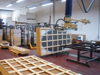 Finished marble tops being crated and prepared for shipment.